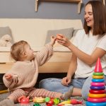 WHAT IS NEWBORN SITTING AND WHY IS IT ESSENTIAL FOR MODERN BABY CARE?